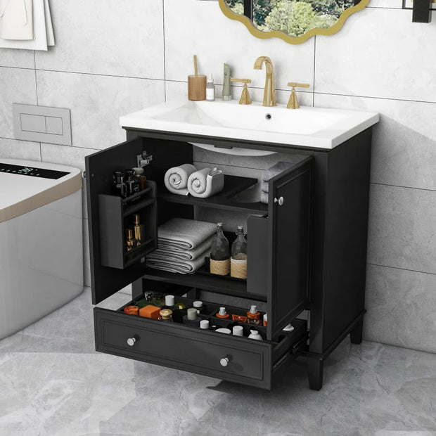 Bathroom vanity with ceramic sink, storage cabinet with doors and drawer, and adjustable shelf.